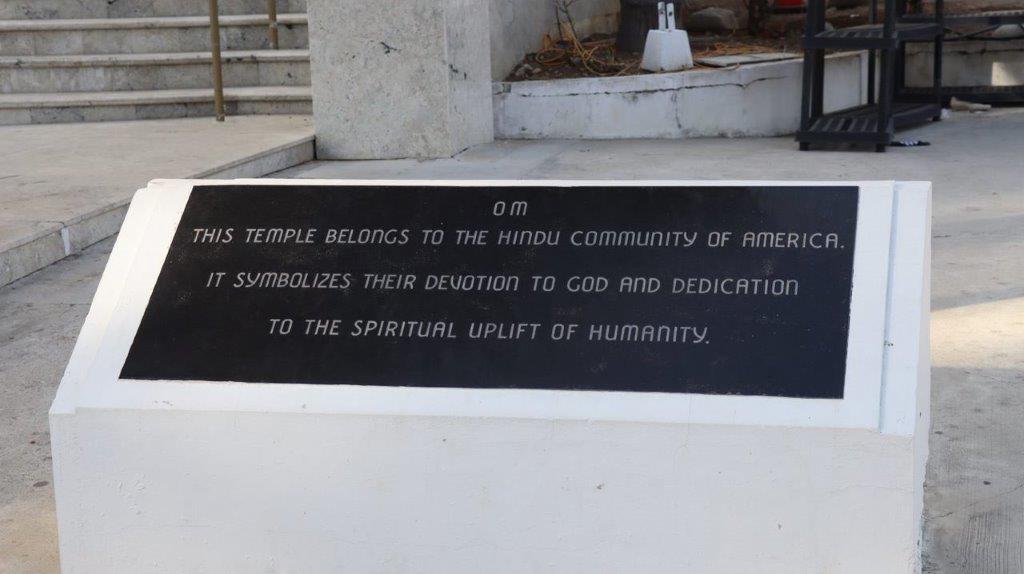 A black sign with white text

Description automatically generated