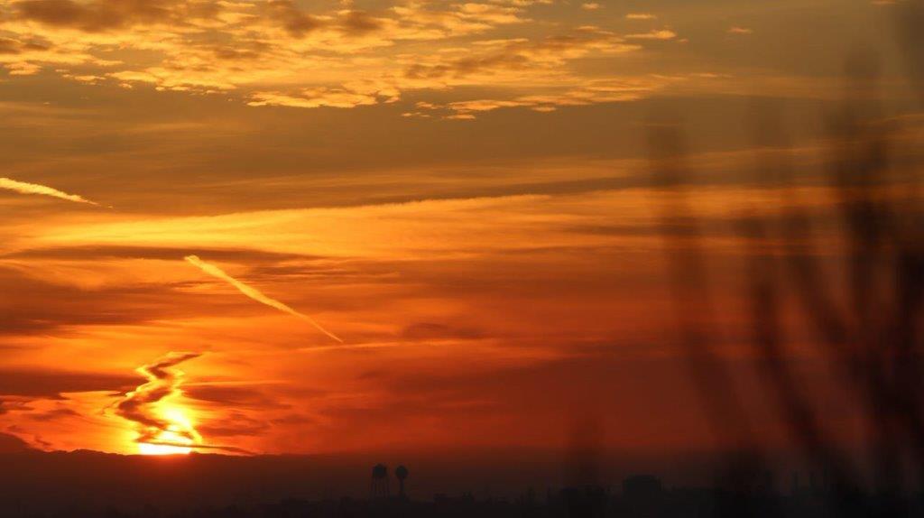 A sunset with a few clouds

Description automatically generated with medium confidence