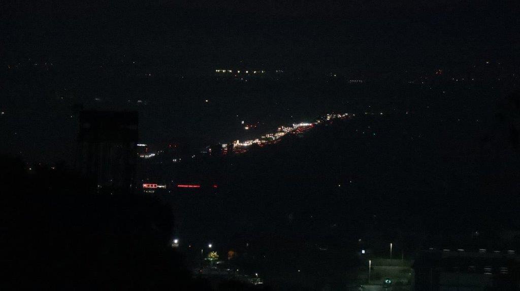 A city lights at night

Description automatically generated
