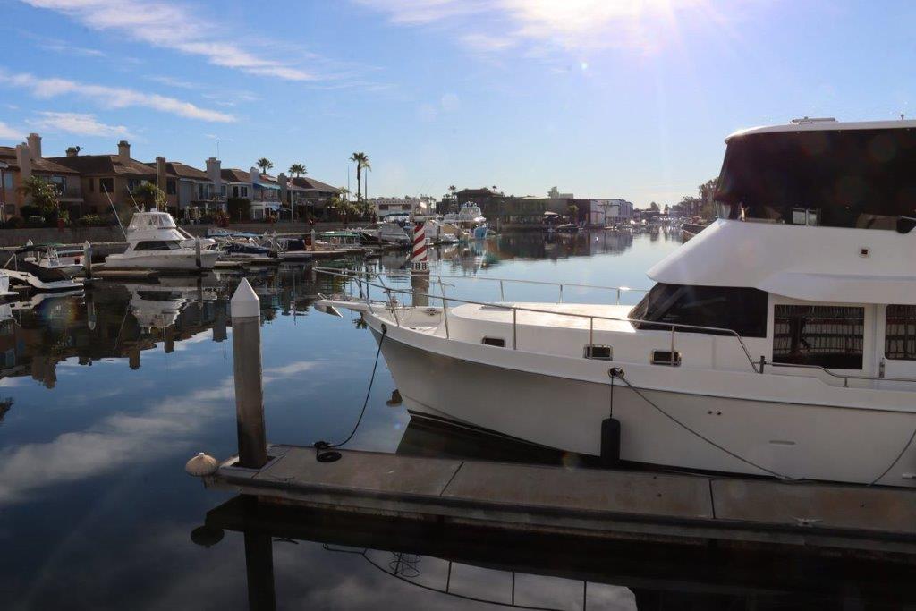 A boat docked in a harbor

Description automatically generated