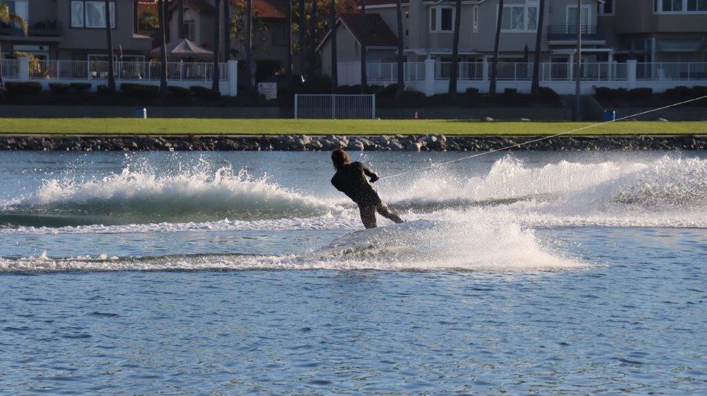 A person surfing on a wave

Description automatically generated