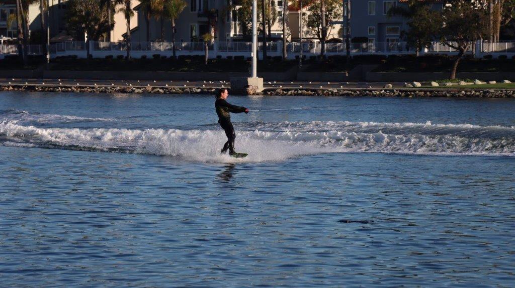 A person on a water ski

Description automatically generated