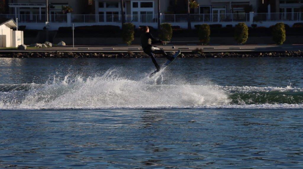 A person on a water ski

Description automatically generated