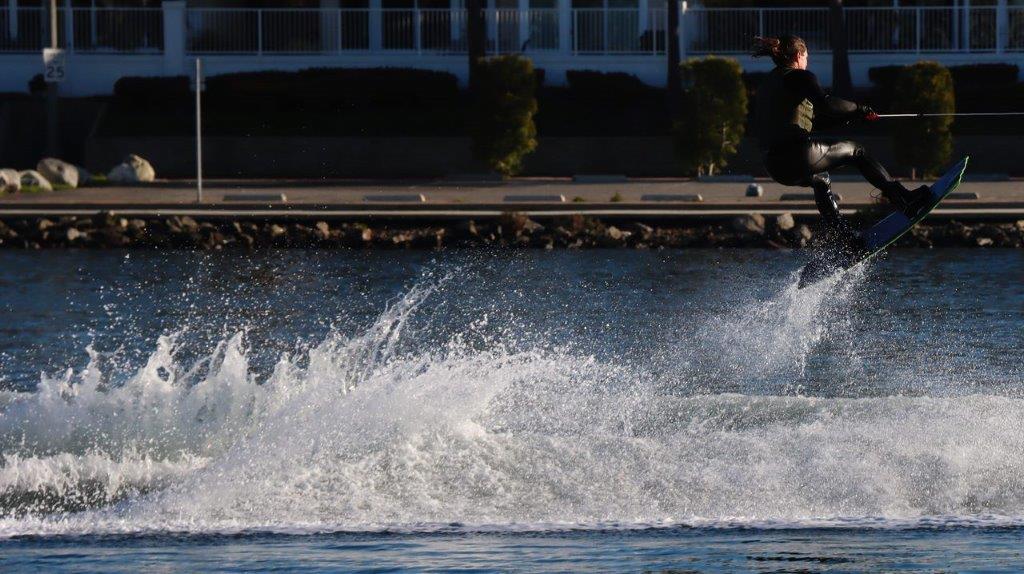 A person riding a wakeboard

Description automatically generated