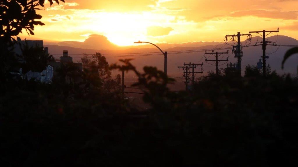 A sunset over a city

Description automatically generated