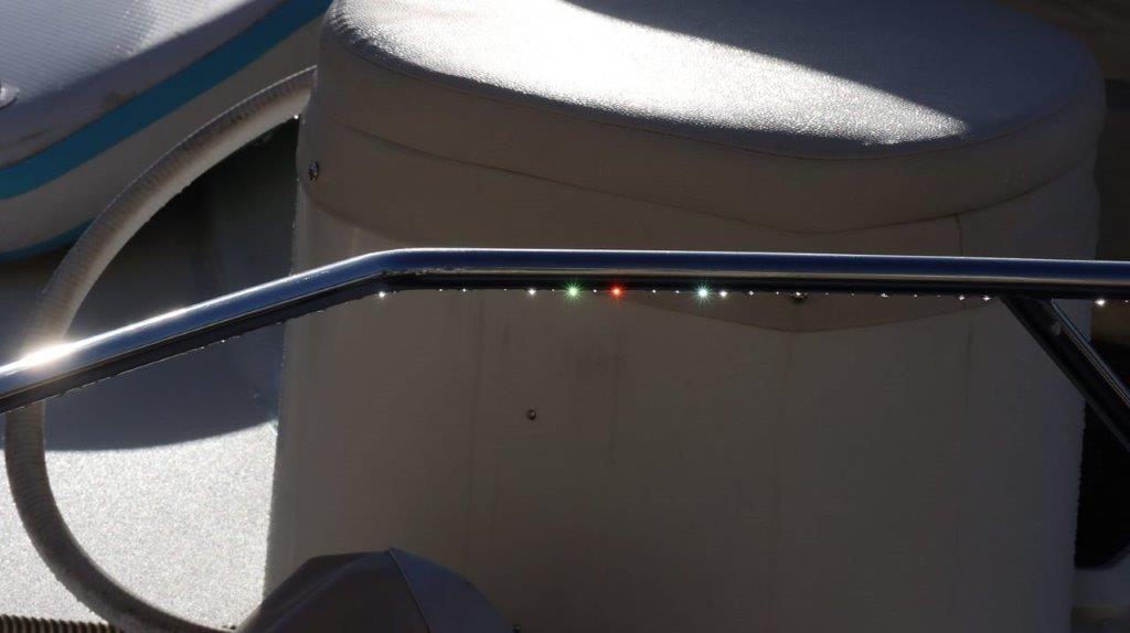 A close-up of a metal railing

Description automatically generated