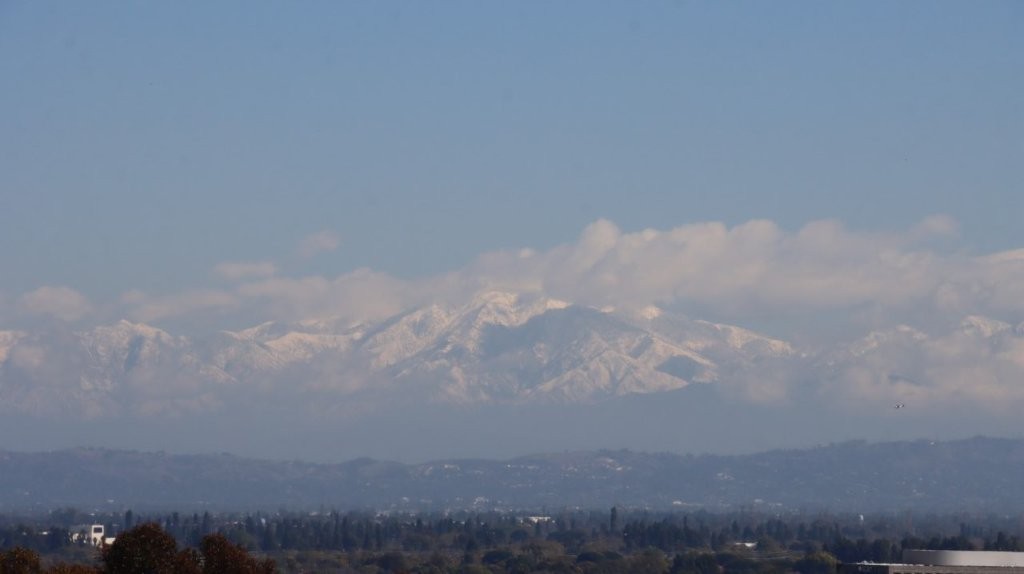 A snowy mountain range in the distance

AI-generated content may be incorrect.