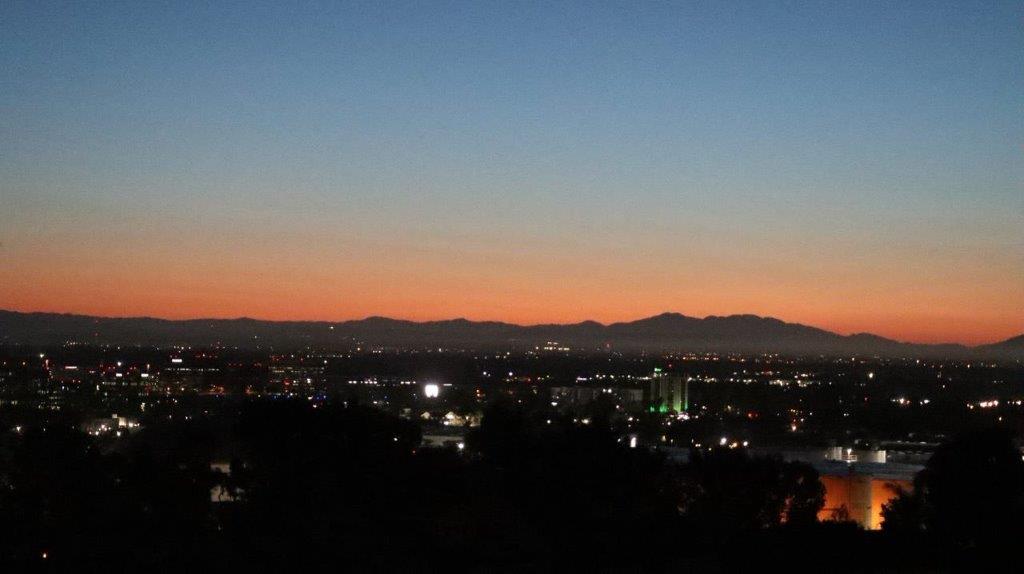 A cityscape with a sunset

Description automatically generated with medium confidence