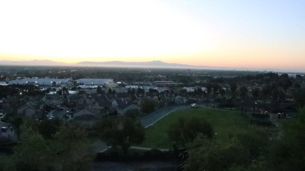A view of a city from a high point

Description automatically generated