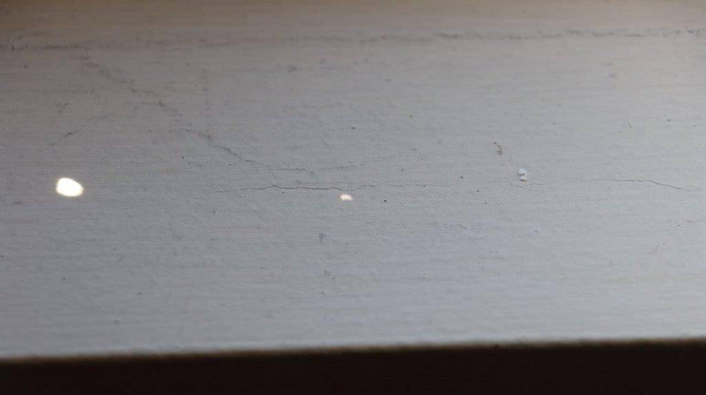 A white speckled surface

Description automatically generated