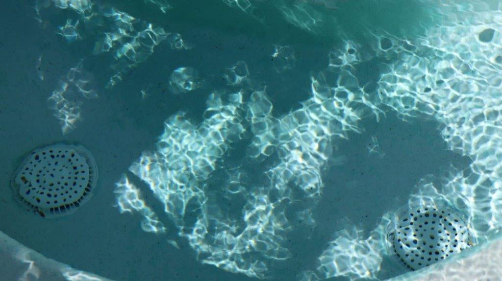 A close-up of a surface

Description automatically generated