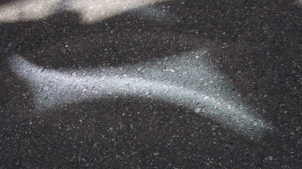 A close-up of a black surface

Description automatically generated