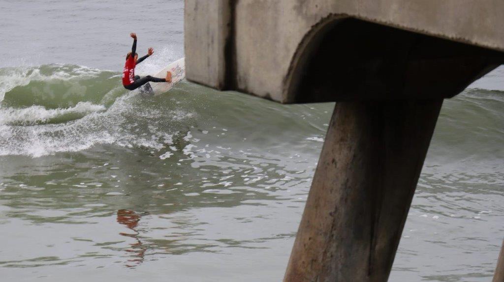 A person surfing on a wave

Description automatically generated