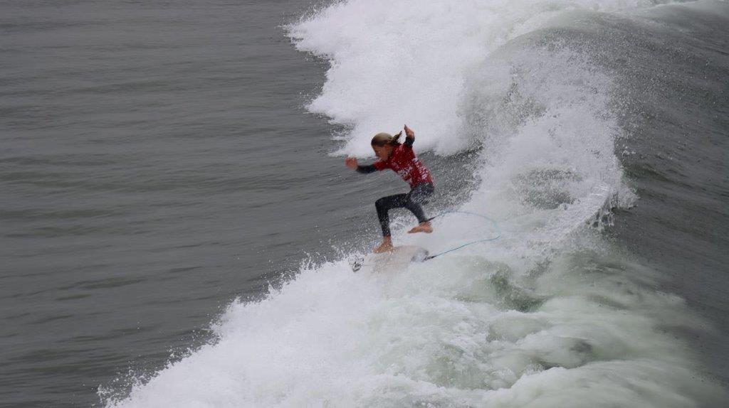 A person surfing on a wave

Description automatically generated