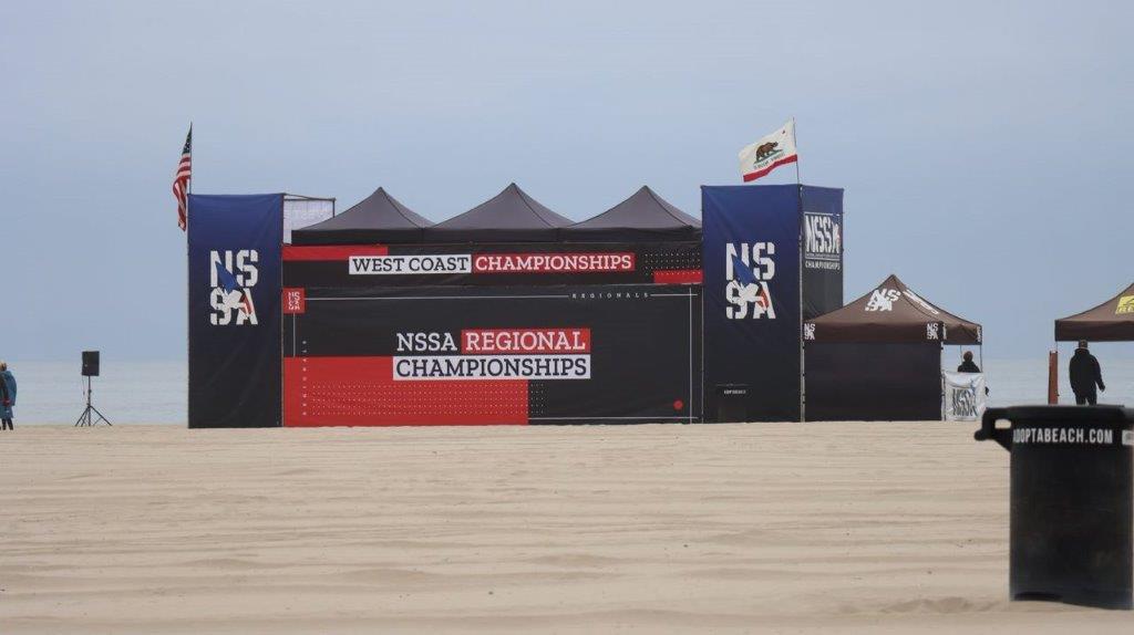 A large black tent with flags

Description automatically generated with medium confidence