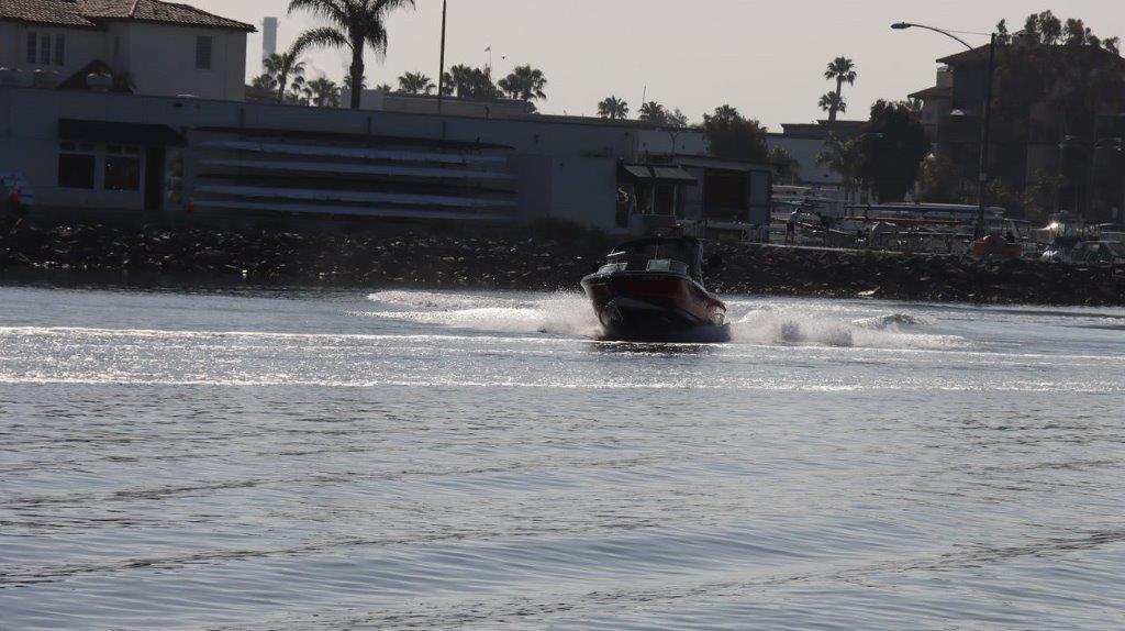 A speed boat in the water

Description automatically generated