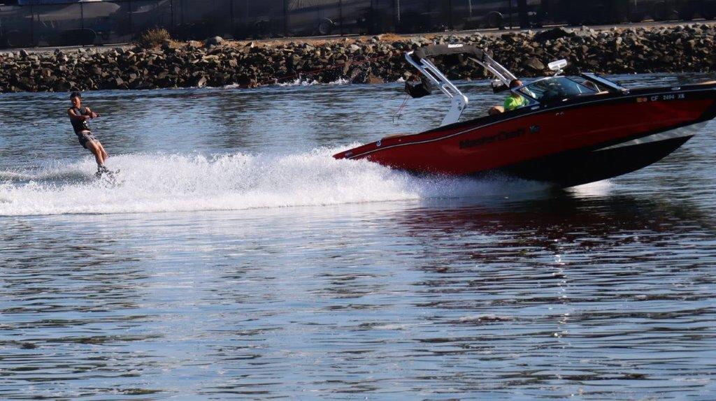 A speedboat moving on water

Description automatically generated