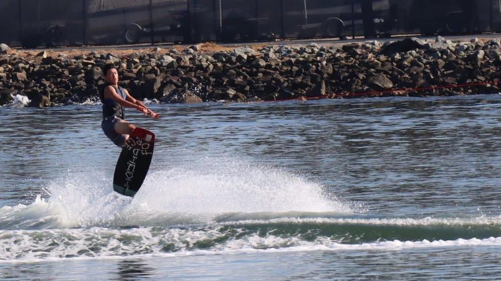 A person on a wakeboard

Description automatically generated
