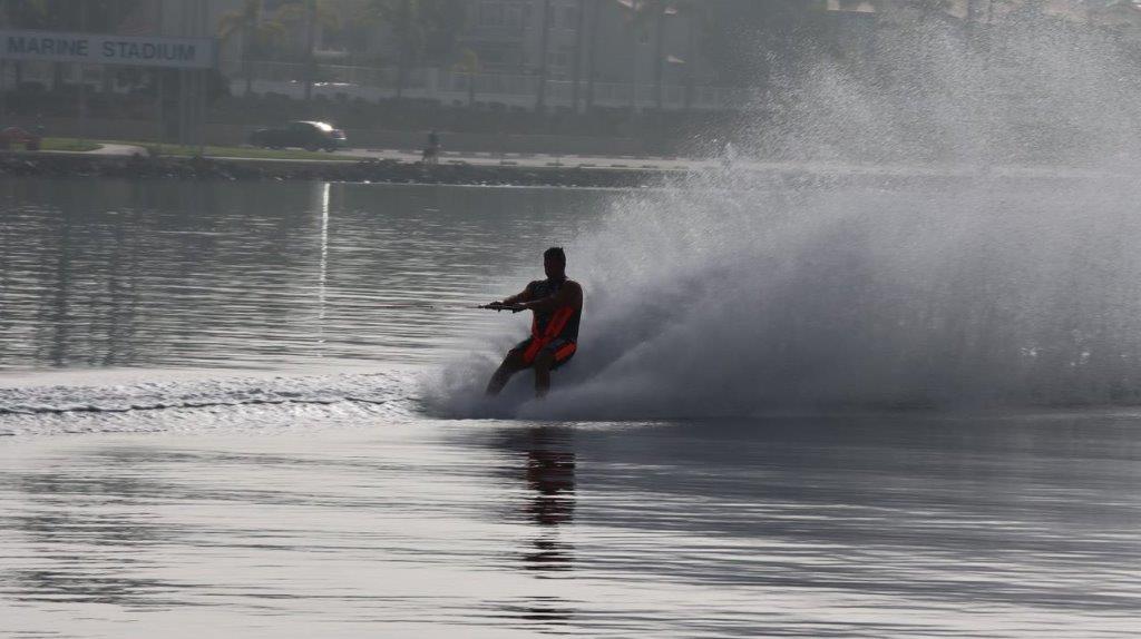A person on a water ski

Description automatically generated